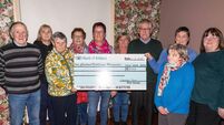Christmas swim proceeds presented to local charities 
