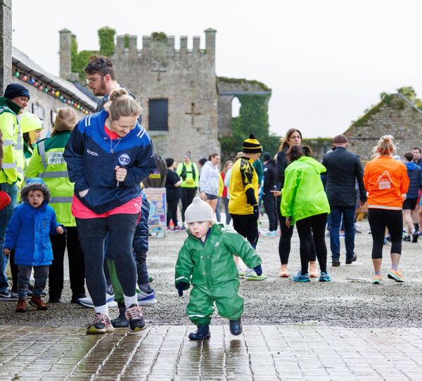 Karen Somers of the organising committee looks on as young Cathal Somers warms up Karen Somers of the organising committee looks on as young Cathal Somers warms up