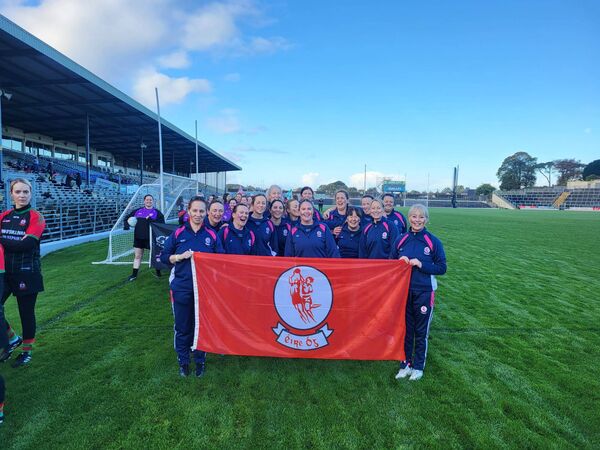 Proudly displaying their club colours Proudly displaying their club colours