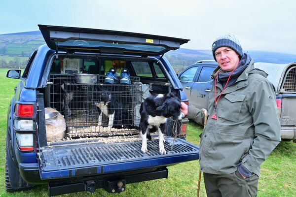 Tom O'Sullivan with his three dogs 