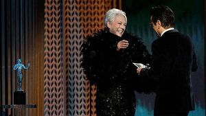 Jamie Lee Curtis presents SAG prize to Colin Farrell, saying he gave her Covid