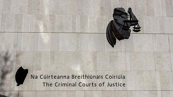 Mother of woman stabbed to death tells court the accused threatened to kill her daughter