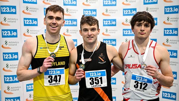 Men's 200m medallists, Marcus Lawler, gold, centre, Adam Murphy of Tinryland AC, Carlow, silver, left, and Luke Timlin, bronze, right, at the 123.ie National Senior Indoor Championships at the National Indoor Arena on the Sport Ireland Campus in Dublin Photo: Sam Barnes/Sportsfile 