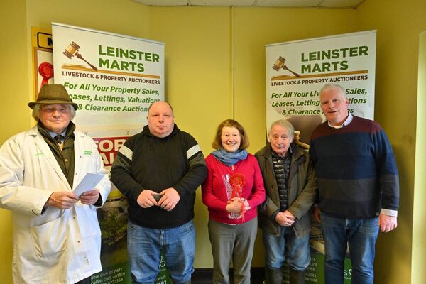 Winners of the best pen of cattle at the recent show and sale in Leinster Marts Carlow, Leigh Murphy, Lily Murphy, Tommy Murphy with Jimmy Walsh mart manager (left) and John Brennan chairman of Leinster Marts (right) Photos: Roger Jones