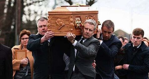 Patrick Kielty carries mother’s coffin as mourners gather for funeral