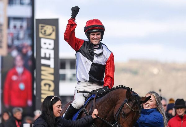 Danny Mullins celebrates after winning the Coral Cup Hurdle on Jimmy Du Seuil Photo:©INPHO/Tom Maher