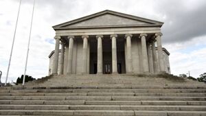 Father pleads guilty while son is contesting charges