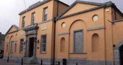 Woman charged with stealing €2 package of biscuits