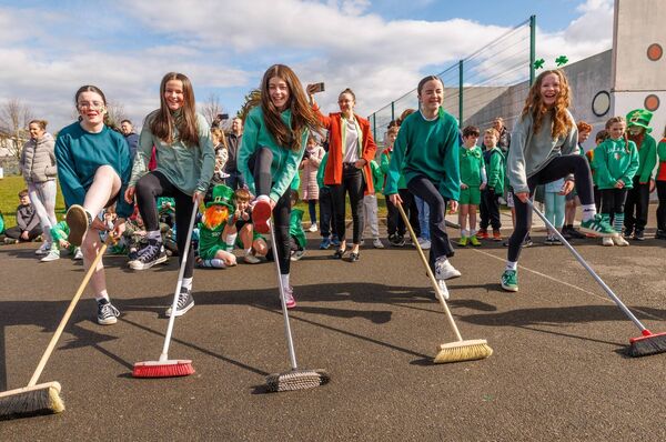 Sixth class girls taking part in the brush dance