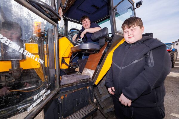 Brandon and Craig Bolger taking part in the tractor run to raise funds for Éist Cancer Support Centre