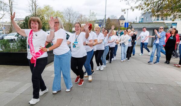 Ann Hurley leads a conga line with her work colleagues as she celebrates her birthday and retirement from Penneys Ann Hurley leads a conga line with her work colleagues as she celebrates her birthday and retirement from Penneys