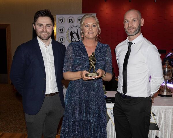 Paul Whelan and Darroch Mulhall presented Paula Lomax with the Fenagh GFC Player of the Year award on behalf of her son Cormac Lomax.