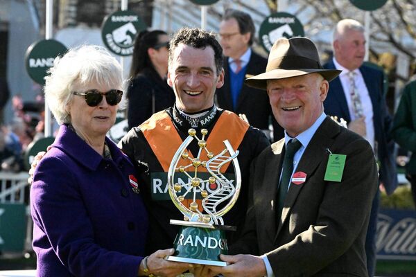 Patrick Mullins with his parents after his wonderful Aintree Grand National win on Nick Rockett Photo: Pat Healy