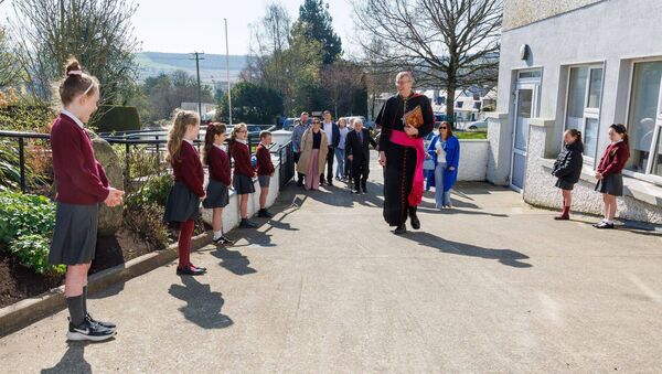 Second class pupils welcome Bishop Denis Nulty and guests to Clonegal NS for the official opening Second class pupils welcome Bishop Denis Nulty and guests to Clonegal NS for the official opening