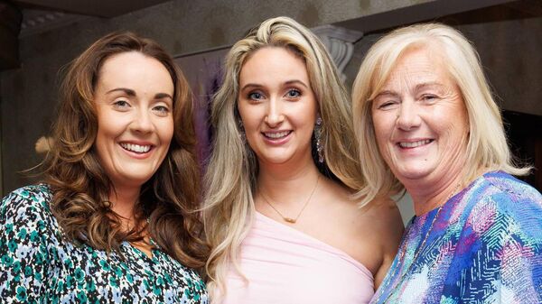 Sarah and Elaine Doogue with Nicole Murray (centre)