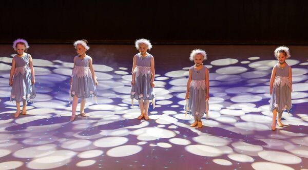 The Snowflakes performing on stage