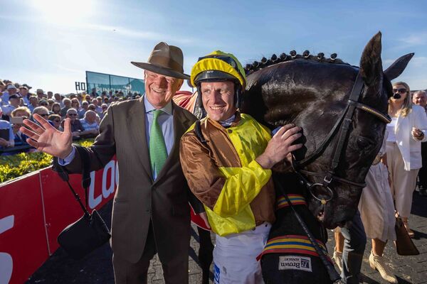 Willie Mullins and jockey Paul Townend celebrate winning The Ladbrokes Punchestown Gold Cup (Grade 1) with Galopin Des Champs Willie Mullins and jockey Paul Townend celebrate winning The Ladbrokes Punchestown Gold Cup (Grade 1) with Galopin Des Champs