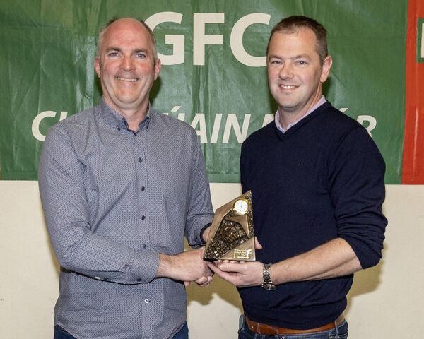 Ken McLoughlin presents the juvenile club person of the year award to Mark Townsend Ken McLoughlin presents the juvenile club person of the year award to Mark Townsend