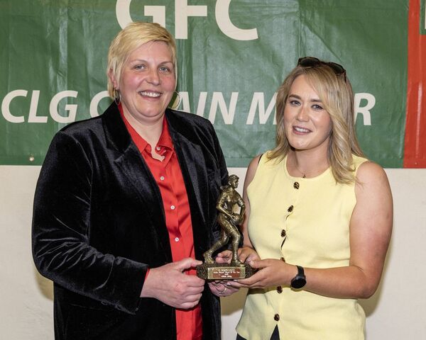 Trish Kelly presents the St Brigid's junior player's player of the yeard to Fiona Hobson on behalf of Elisha Ryan Trish Kelly presents the St Brigid's junior player's player of the yeard to Fiona Hobson on behalf of Elisha Ryan