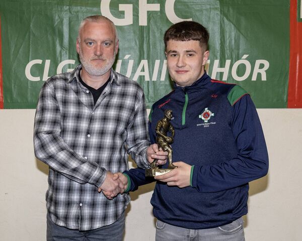 Paul Byrne presents the young player of the year award to Lewis McDonnell Paul Byrne presents the young player of the year award to Lewis McDonnell