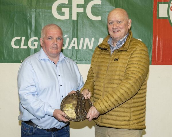 James Doyle chairman Clonmore GFC presents the Hall of Fame award to John Connolly James Doyle chairman Clonmore GFC presents the Hall of Fame award to John Connolly