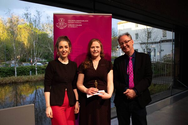 Aishling Nic an Tuile (centre), winner of the first prize for prose, with poet Victoria Kennefick and Dr Derek Coyle 