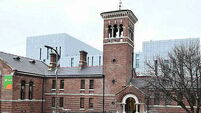 Wife says husband poured boiling water on her and attacked her with claw hammer