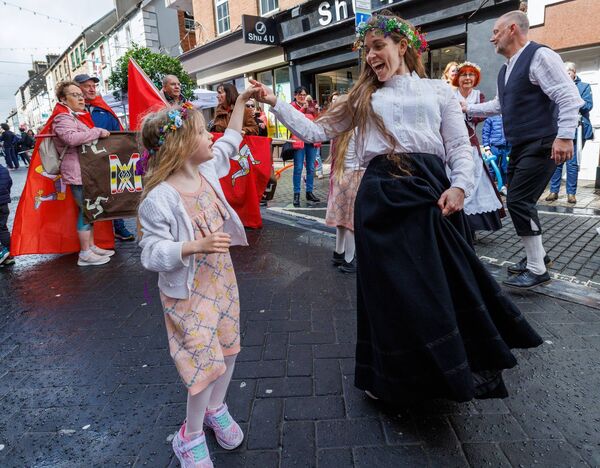 Traditional dancing during the Pan Celtic Festival parade on Tullow Street