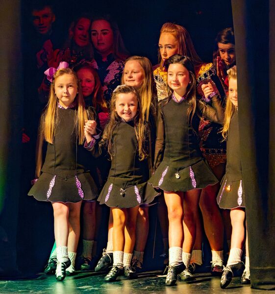 Dancers from the Dargan School of Dance wait in the wings to take to the stage at the festival's official opening 