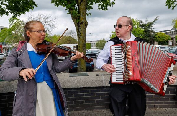 Celtic musicians playing traditional music at the Library Tree 