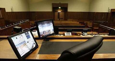Woman (48) weeps in court as she admits killing her partner