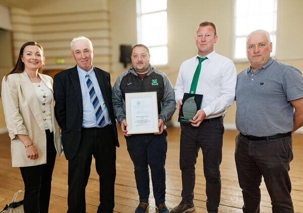Ballymurphy Celtic AFC's Thomas Doyle (chairman), John Whelan (secretary), Tom Joyce and Karen White (committee) with cllr Willie Quinn (second left)