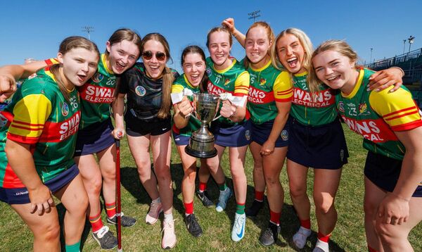 Carlow players celebrate with the Leinster trophy Carlow players celebrate with the Leinster trophy