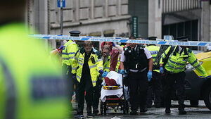 Man detained after car collides with pedestrians during Premier League parade