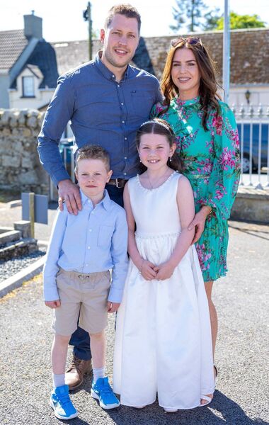 Sadie McAssey with her family