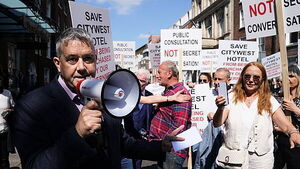Row breaks out at protest over Government plans to buy CityWest Hotel Row breaks out at protest over Government plans to buy CityWest Hotel