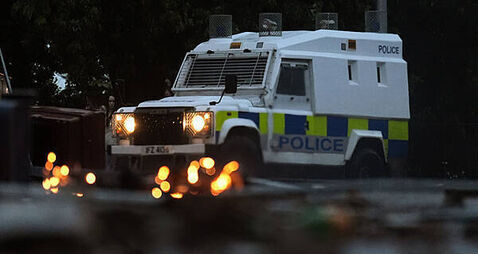 Police come under attack for fourth night in North