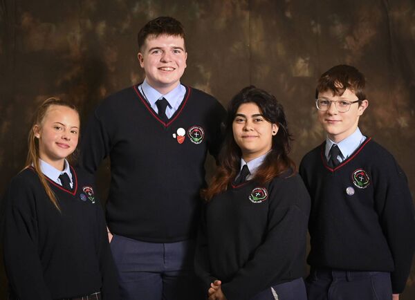 Meitheal leaders Jaqueline Vasquez Holguin and Matthew Hosey were presented with their prize by student council members Evelyn Chioreau and Lorcan O'Brien Meitheal leaders Jaqueline Vasquez Holguin and Matthew Hosey were presented with their prize by student council members Evelyn Chioreau and Lorcan O'Brien