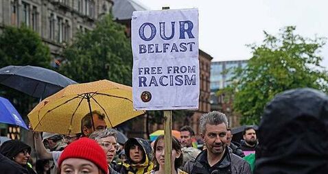 Northern Ireland one petrol bomb away from a racist murder, Belfast rally hears