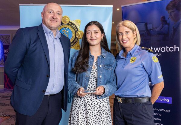 Holly Long, winner of the Kilkenny/Carlow Garda Youth Area Award, with Colin Hayes (MD of Netwatch) and Kate Glennon (Carlow Garda Station)