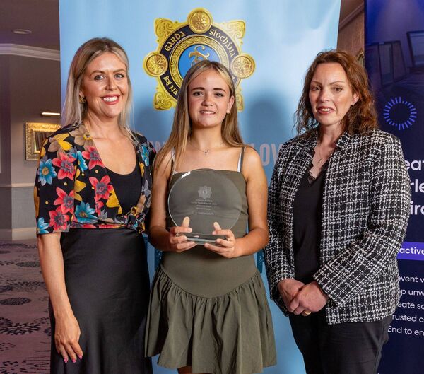Maisie May Rowe, winner of the Kilkenny/Carlow Garda Youth Area Award, with Darrell Codd (Carlow Garda Station) and Natasha Newsome Drennan TD