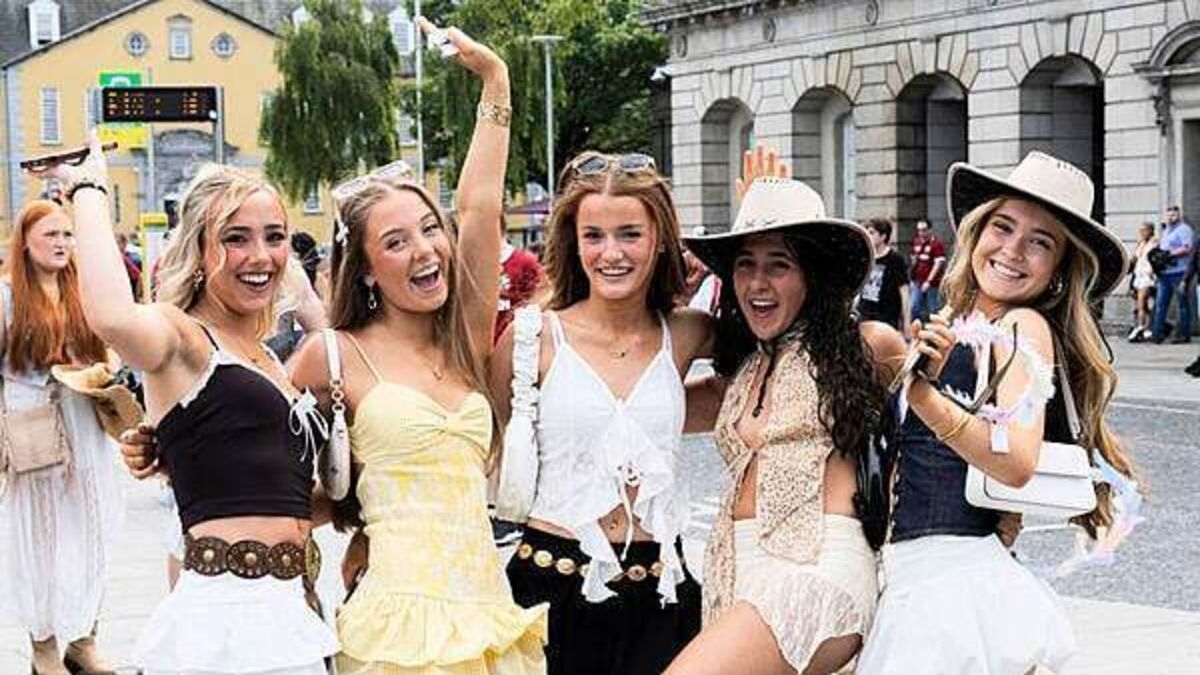 In photos: Crowds enjoy sunshine on year's hottest day ahead of busy weekend of events