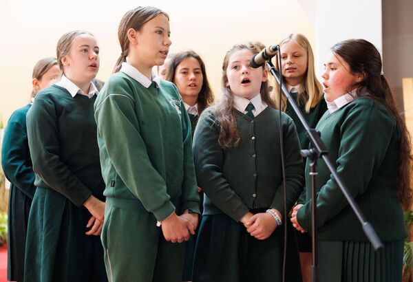 Members of the choir performing during the celebration Mass in the Holy Family Church, Askea