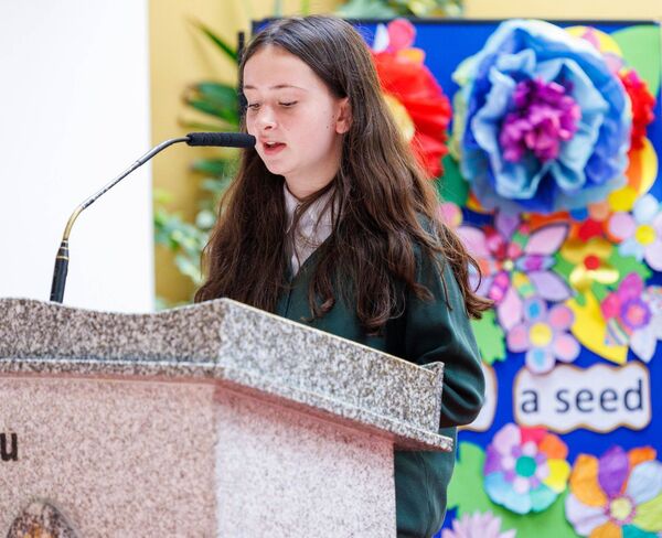 Willow reads the 'Reflection' during the celebration Mass
