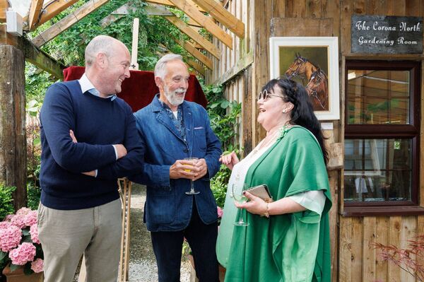 Jacinta Crowley-Long chats with Alex Lyle and Seamus Cassells at the opening of her exhibition