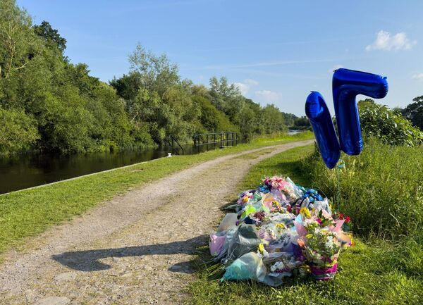 Floral tributes at the scene where Peter Byrne tragically drowned while swimming with friends at Milford, Co Carlow Photo: michaelorourkephotography.ie