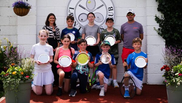 Front row: Siofra Bolger, Ella Lawlor, Ruadhan Moore, John McDonald, Edward Blazevic Back row: Deirdre Murphy (Vice-captain), Adam Lyons, Claire McDonnell, Jack Byrne, Brian Farrell (Director of Tennis) Front row: Siofra Bolger, Ella Lawlor, Ruadhan Moore, John McDonald, Edward Blazevic Back row: Deirdre Murphy (Vice-captain), Adam Lyons, Claire McDonnell, Jack Byrne, Brian Farrell (Director of Tennis)