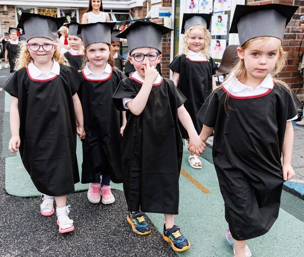 Pre-school graduates arrive for the ceremony