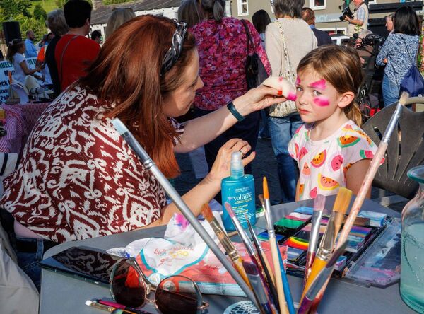 Ali Butterworth has her face painted by Noelle Lancaster during the launch Ali Butterworth has her face painted by Noelle Lancaster during the launch