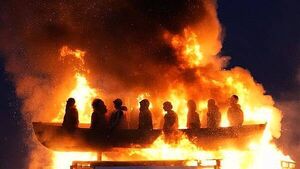 Tyrone bonfire topped with migrant boat effigy is set alight Tyrone bonfire topped with migrant boat effigy is set alight